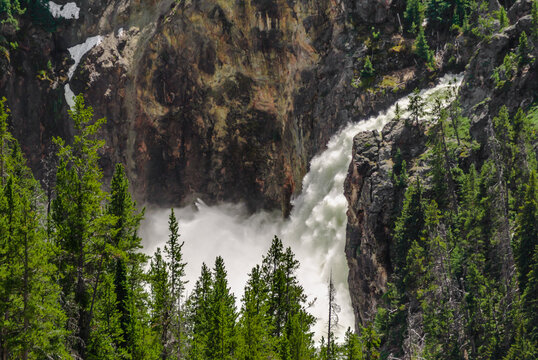 Upper Falls raging with snow melt, Yellowstone National  Park.