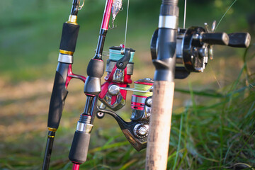 Spinning rods with reels ready for fishing