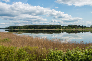 Beautiful rural landscape, lake, sky with clouds. belarus.
