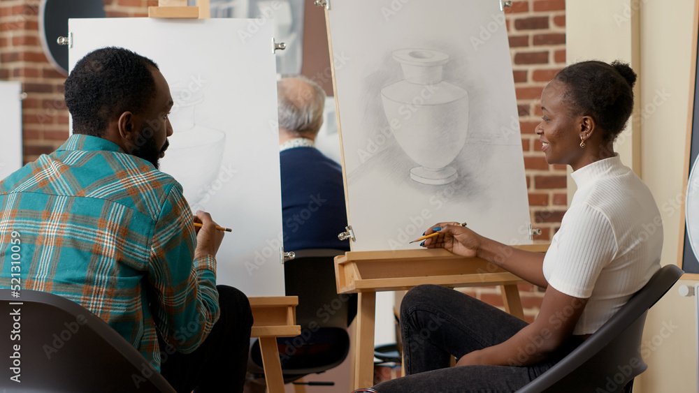 Fototapete african american man and woman drawing object design with artistic tools in eduxational workshop pro