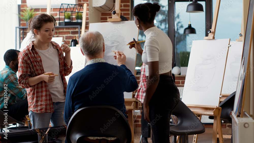 Poster diverse team of women giving drawing lesson to elder person attending art class program, developing 