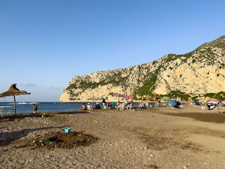 Fototapeta na wymiar People enjoying their summer holiday on the beach