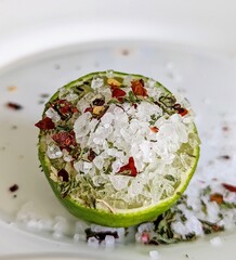 Green lemon, salt and chili flakes