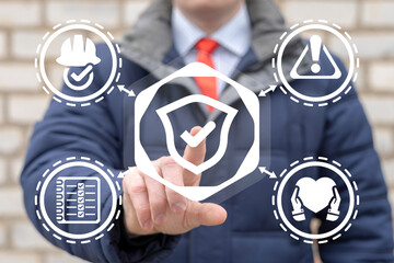 Man using virtual touchscreen presses a icon: shield with check mark. Work safety standards concept.