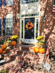 Entrance door of the house decorated for Halloween
