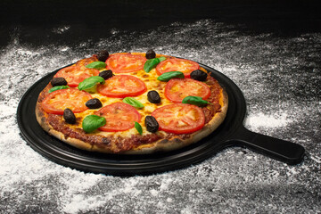 vegetarian italian Pizza with tomatoes, mozzarella cheese. Delicious italian pizza