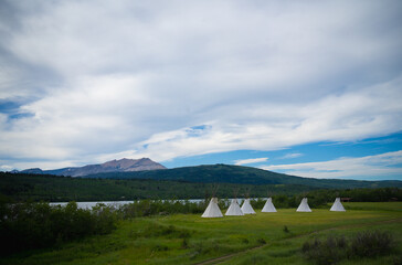 Random group of teepees in a field © SETH