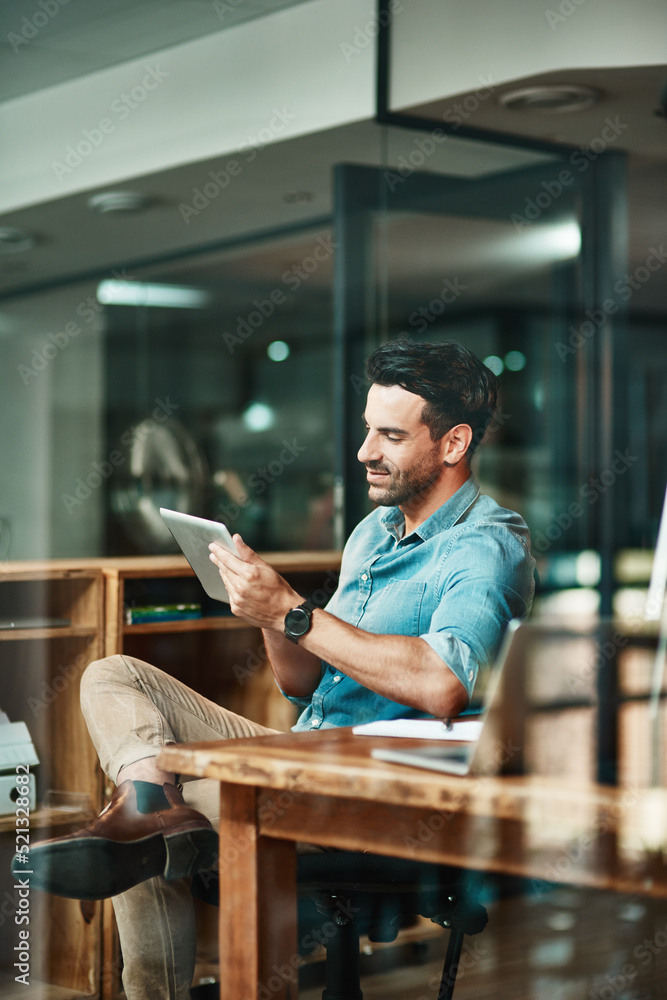 Aufkleber confident, relaxed and carefree entrepreneur, creative designer or project manager browsing on a tab