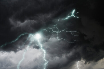 Naklejka na ściany i meble Super dangerous lightning in black clouds of Typhoon strom