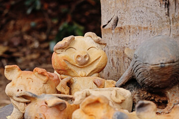 a clay doll for growing green plant