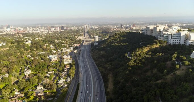 Aerial Reversing Above The Freeway And The Getty Research Institute Hillside Campus - Los Angeles, California