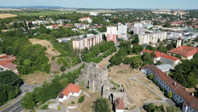 Circling drone establishing aerial shot of Levice Castle, Hrad in Slovakia