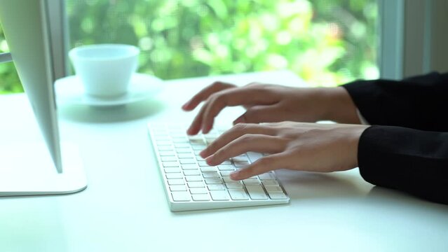Woman hands typing keyboard