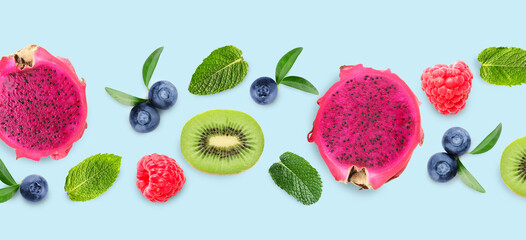 Collage of tasty fresh fruits and berries with mint leaves on light blue background
