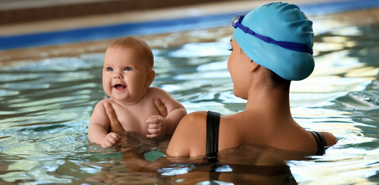 Cute little baby with mother in pool