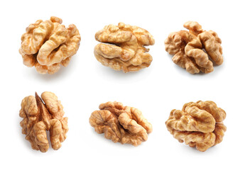 Set of tasty peeled walnuts isolated on white