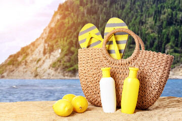 Beach accessories with bag on sand at sea resort