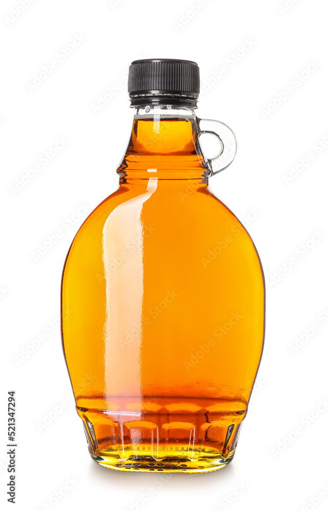 Wall mural bottle of maple syrup on white background