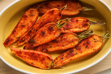 Baking dish with tasty baked carrots, closeup