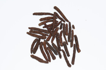 Long pepper or Piper longum isolated on white background