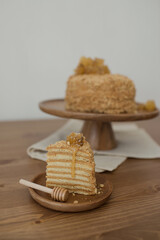 Honey cake on a wooden stand