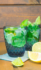 Two glasses with refreshing lemonade on the table