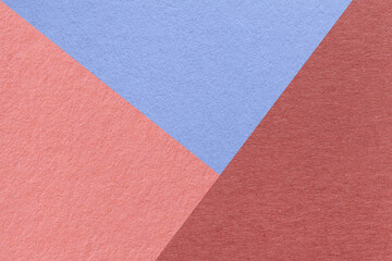 Fototapeta premium Texture of craft red, pink and very peri color paper background, macro. Structure of vintage abstract rose cardboard
