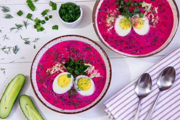 Cold beet soup - traditional cold beetroot soup with yogurt, egg, dill, chives and cucumber. A...