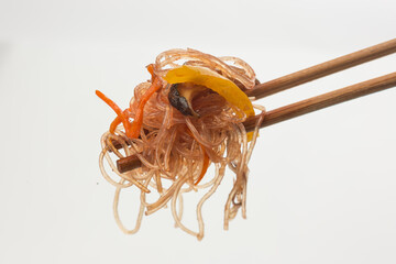 Pasta with vegetables on a white background. food photography, dark background