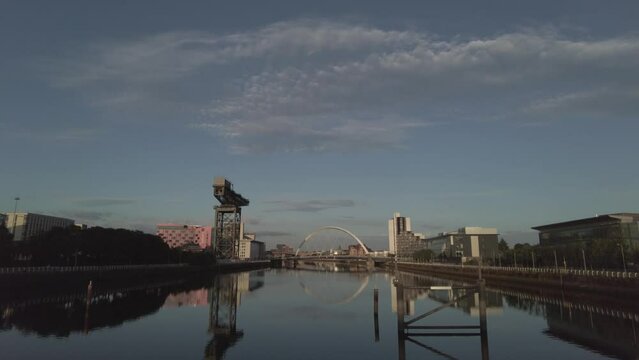 Beautiful view of architecture looking down the River Clyde in Glasgow on a sunny day