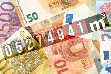 Euro Geldscheine und ein Gaszähler