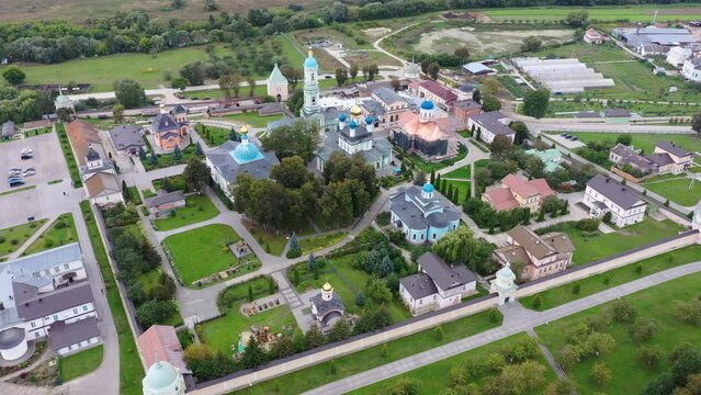 Aerial footage of Optina Pustyn monastery on cloudy day. Kaluga Oblast, Russia.