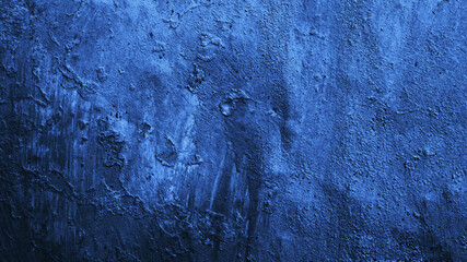 Dark blue texture. Old painted wall. Close-up. Gradient. Grunge background with space for design....