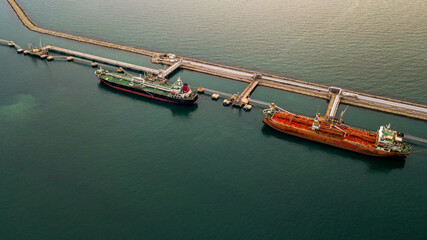 Aerial view tanker ship vessel unloading at port, Global business logistic import export oil and...