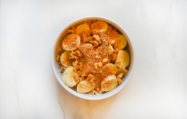 An oat cereal with nuts and banana. Good for any project.