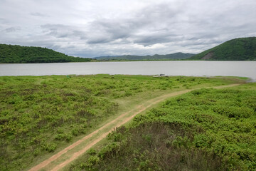 Top view from a drone of the reservoir at Huai Phak Reservoir, Tha Yang District, Phetchaburi,...