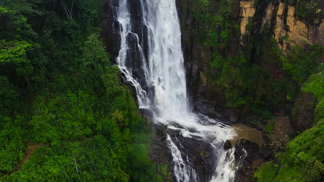 Waterfall in the jungle. Sri Lanka. St. Clair Falls in the rainforest.