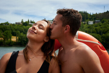 A happy romantic couple at the lake