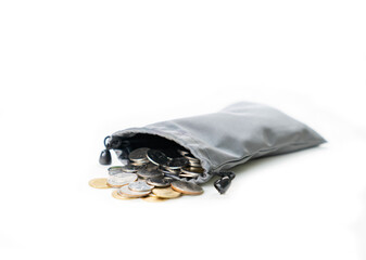 Wealth coin in grey money bag isolated on white background.