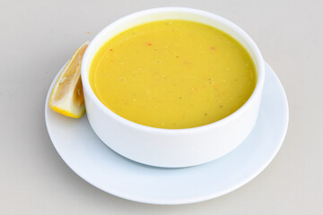 Lentil ( mercimek ) soup with melted butter and red pepper sauce