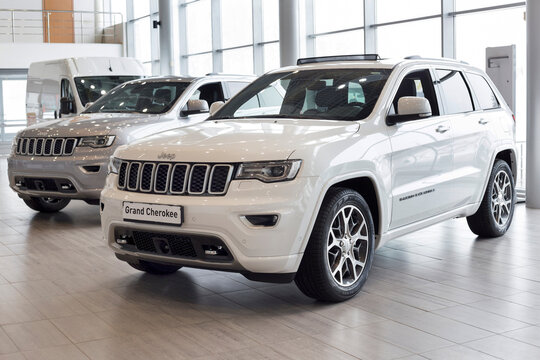 Russia, Izhevsk - March 4, 2022: Jeep showroom. New modern Grand Cherokee in dealer showroom. Off-road vehicles. Alliance Stellantis.