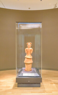 TOKYO, JAPAN - JUL 20, 2022: Tomb Sculpture (Haniwa): Woman in Formal Attire, Important Cultural Property of Japan,  in the Tokyo National Museum in Tokyo, Japan.