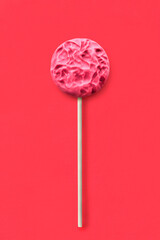 Lollipop on red background