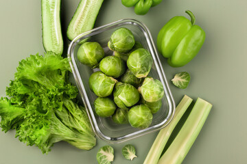 Glass box with fresh brussels sprouts.  Vegetables in a glass containers. Food storage concept