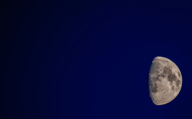 Moon on a blue sky