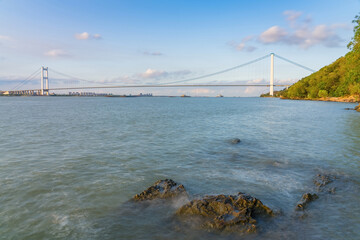 Jiangyin Yangtze River Bridge and cargo ships and Yangtze River scenery in Jiangyin, China