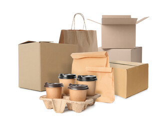 Set with different cardboard boxes, paper bags and takeaway cups on white background