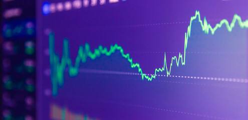Stock market upwards chart on the screen. Selective focus.Low angle.Banner,advertisement.