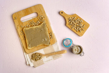 Organic sunflower seed butter. Alternative to butter. Food trend. Flat lay