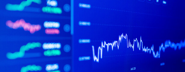 Stock market upwards chart on the screen. Selective focus.Low angle.Banner,advertisement.